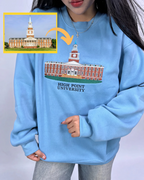 Custom embroidered crewneck featuring architectural artwork and institution typography