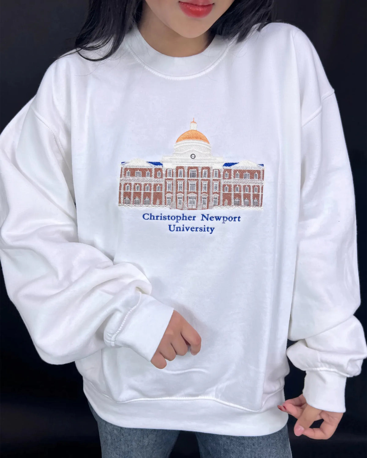 Custom architectural campus design embroidered on a crewneck sweatshirt