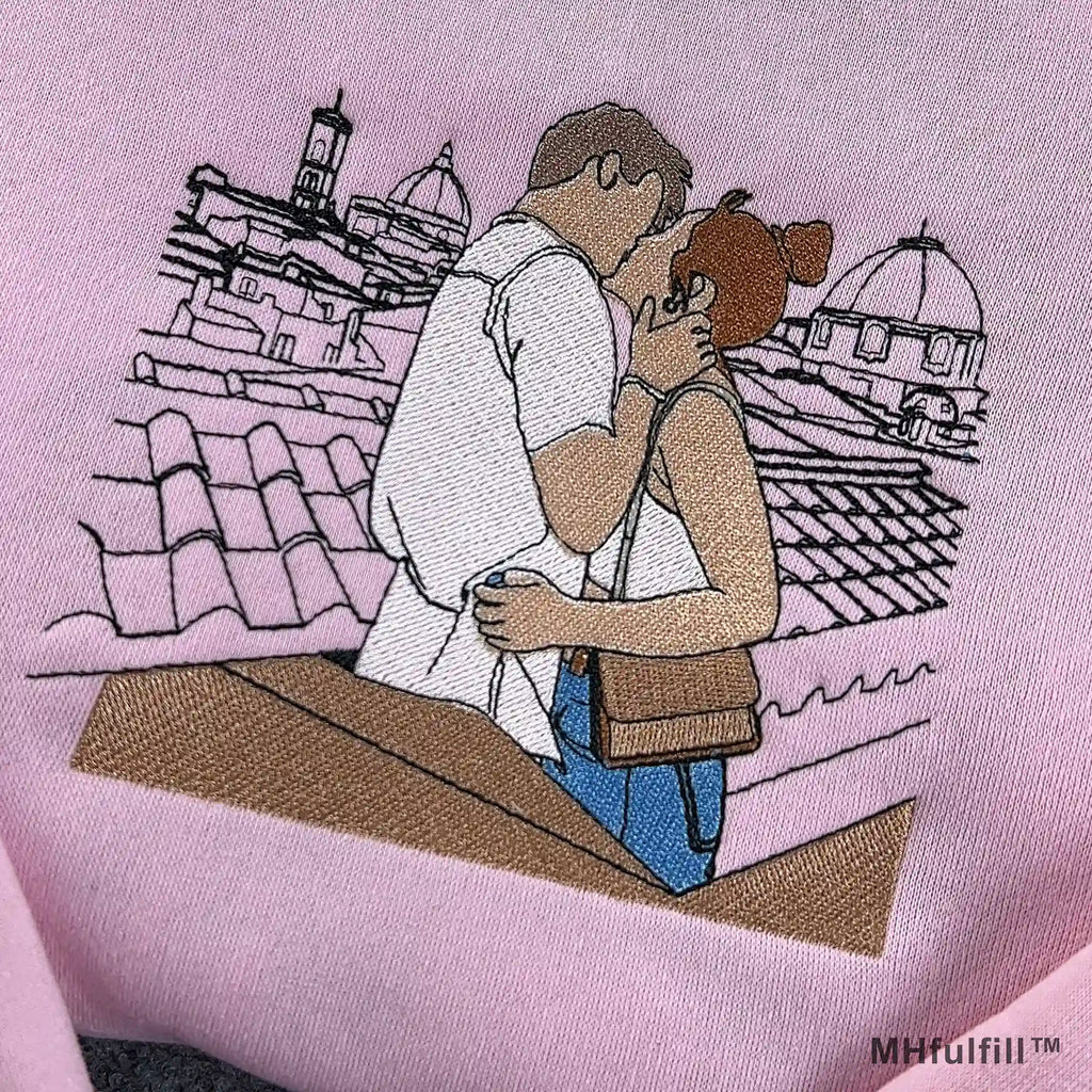 Matching custom embroidered apparel for couples featuring unique personalized photo stitch design.