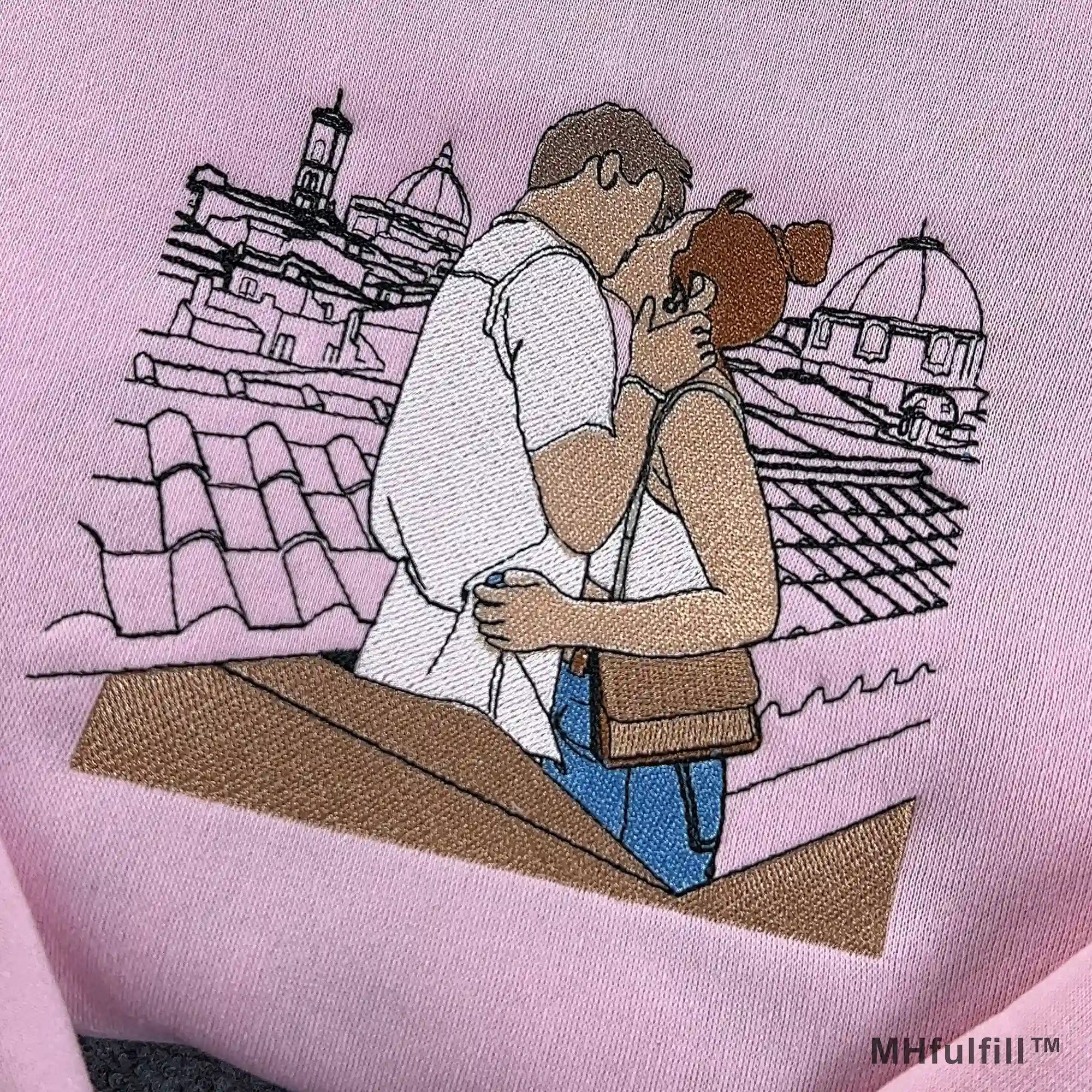Matching custom embroidered apparel for couples featuring unique personalized photo stitch design.