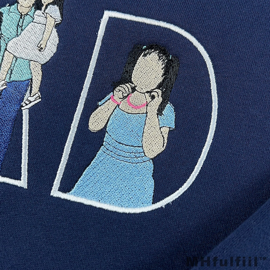 Unique custom line art embroidery gift for dad showing a mother and children embroidered inside text.