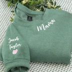 Custom mama sweatshirt in green with personalized embroidered names.