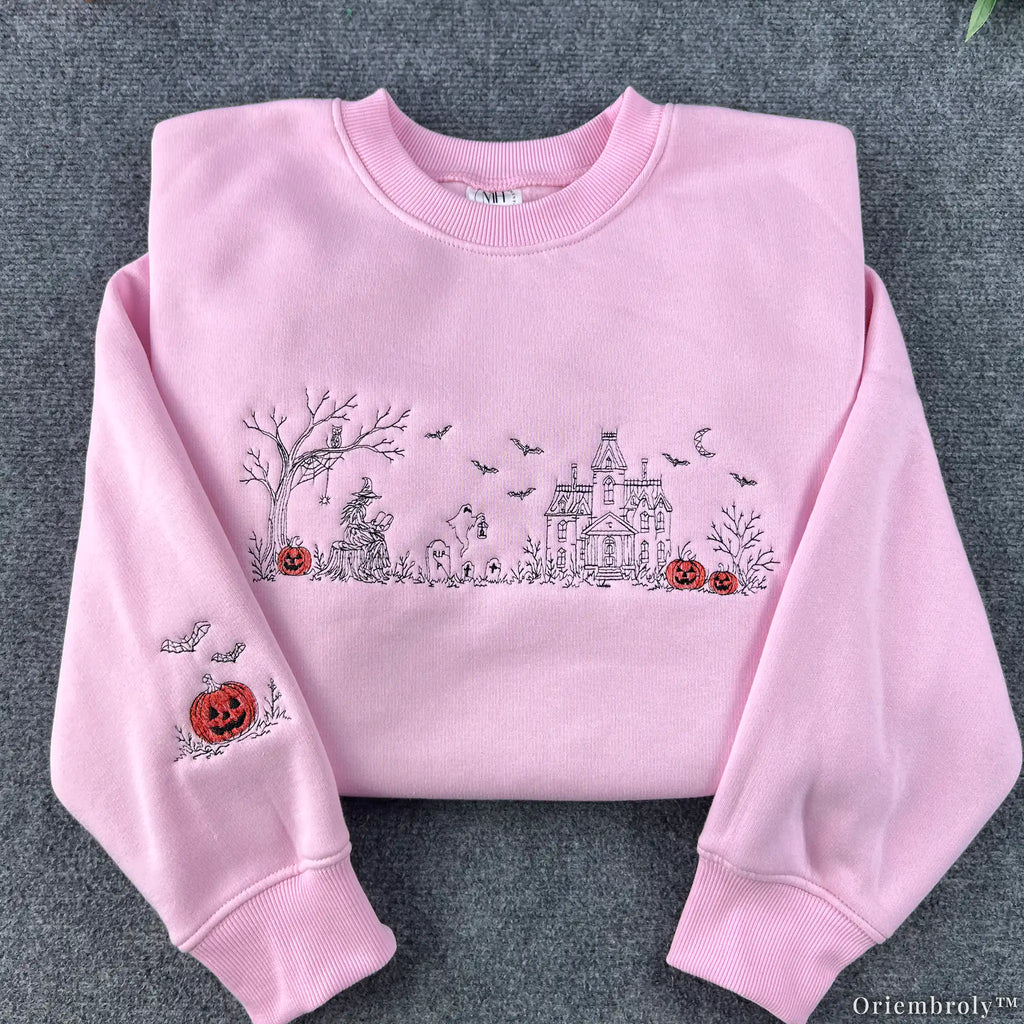 Halloween Village embroidered sweatshirt with witch and haunted house design