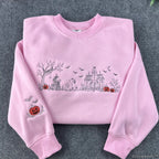 Halloween Village embroidered sweatshirt with witch and haunted house design