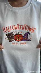HALLOWEENTOWN embroidered crewneck sweatshirt with spellbook and pumpkin