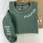 Mama embroidered sweatshirt in green featuring custom names on the sleeve.