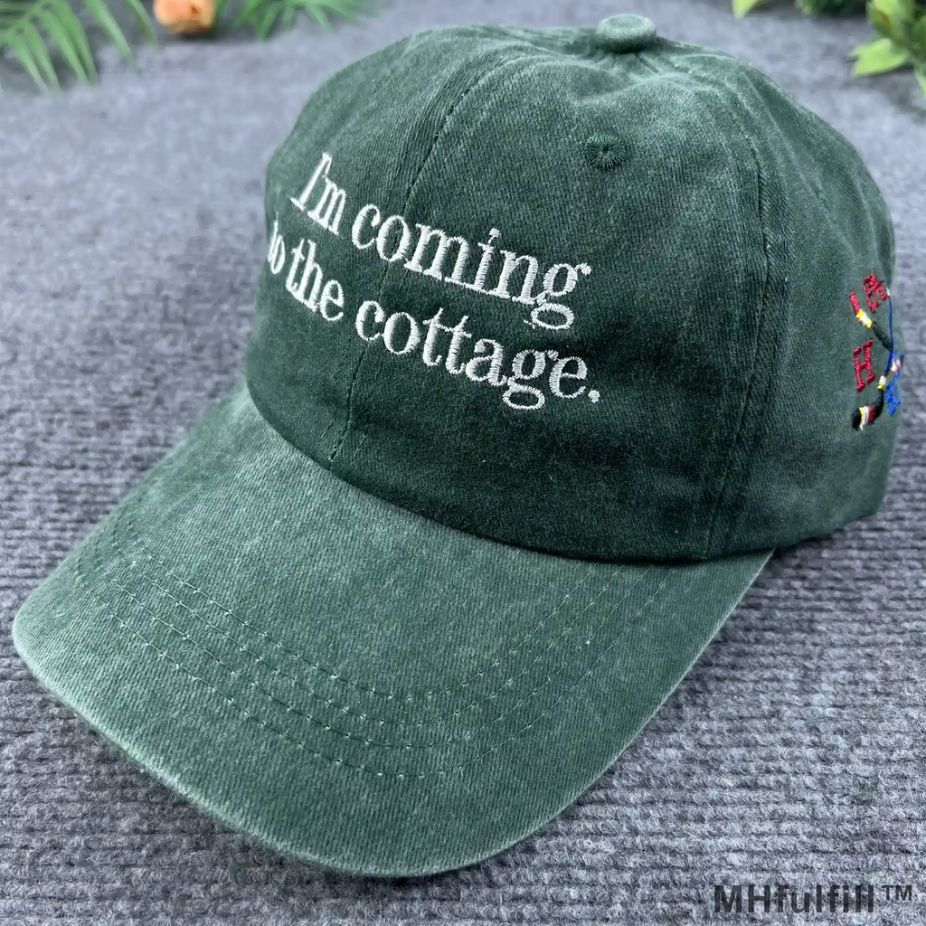 Full studio shot of the limited edition 2026 MHFulfill washed green cotton embroidered cap.