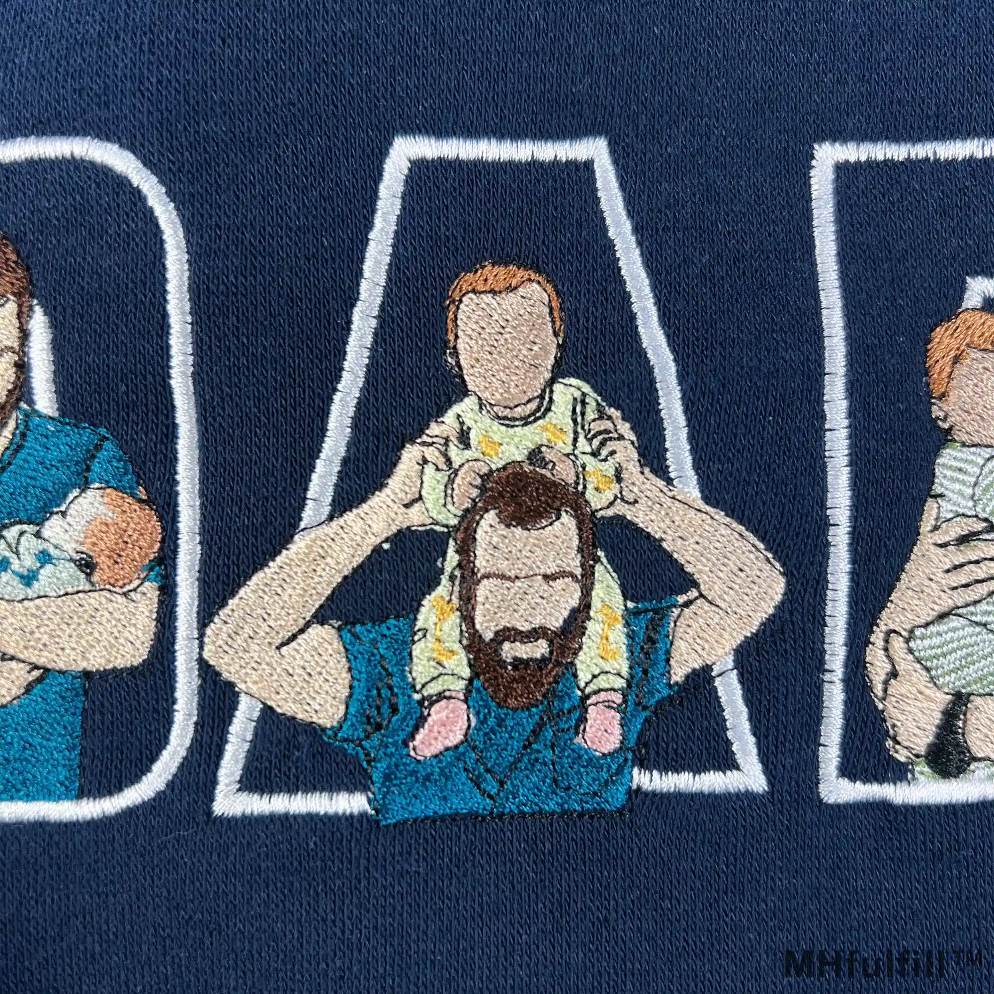 Close-up of high-quality custom embroidery detailing on the MHfulfill Dada sweatshirt.
