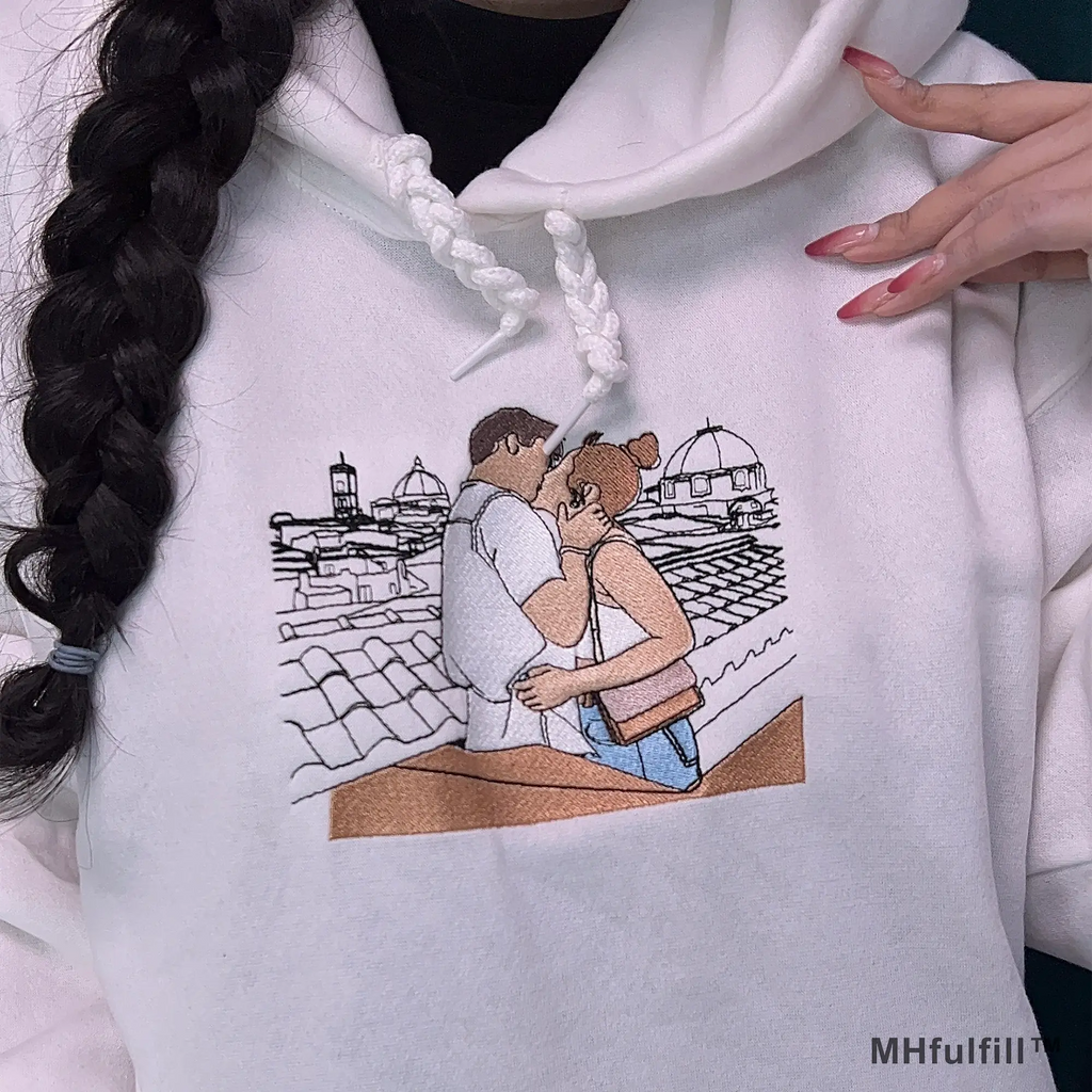 Soft fleece interior and premium cuff details of an oversized custom photo stitch hoodie.