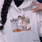 Soft fleece interior and premium cuff details of an oversized custom photo stitch hoodie.