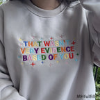 Model wearing an oversized custom embroidered evidence based sweatshirt in a streetwear style.