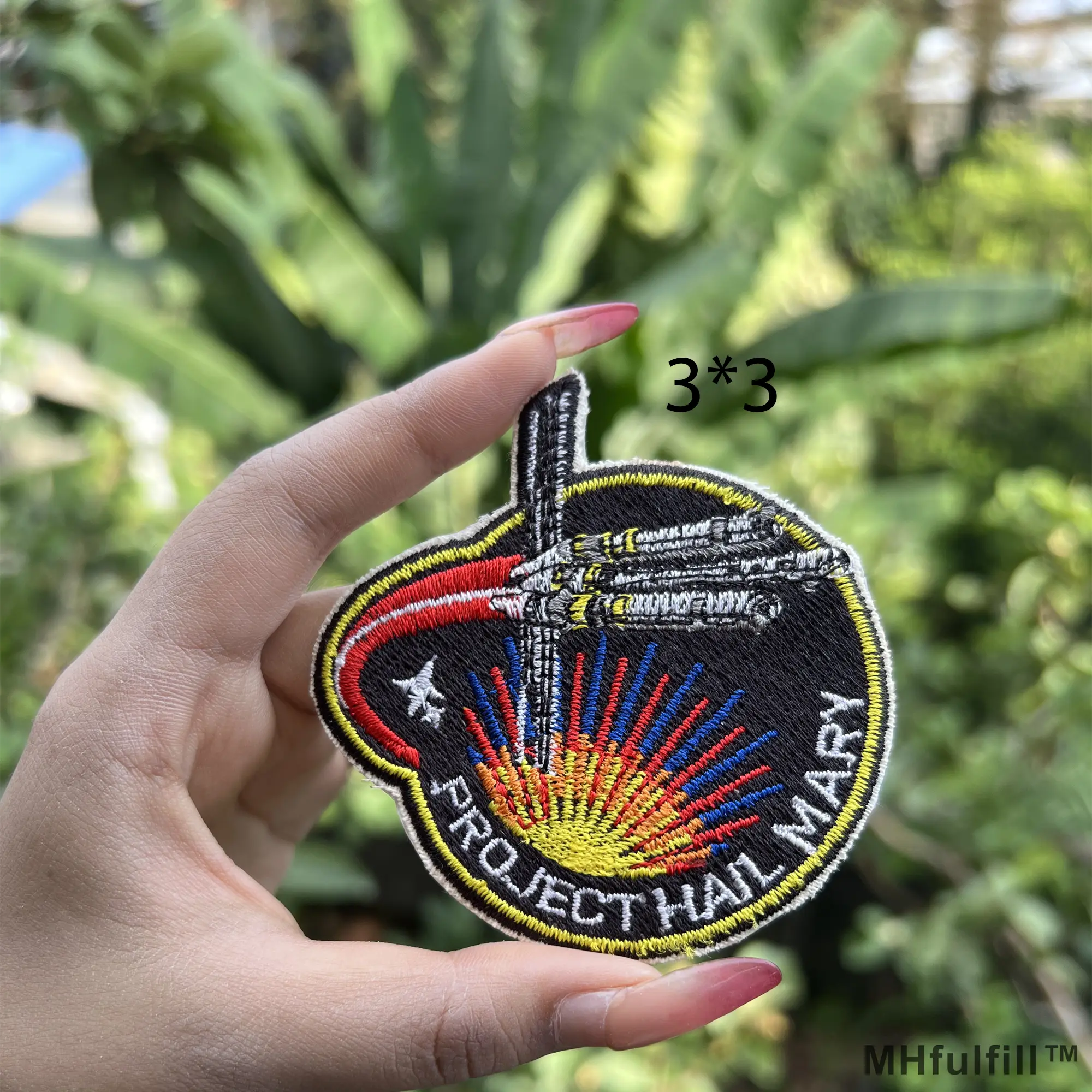Project Hail Mary PVC patch attached to a military tactical backpack panel.