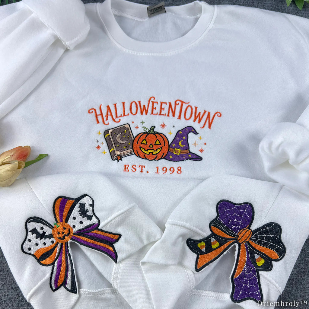 Side Bow Halloween embroidered sweatshirt with vintage witch book design