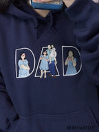 Custom embroidered navy blue hoodie featuring "DAD" text filled with a personalized family portrait outline.