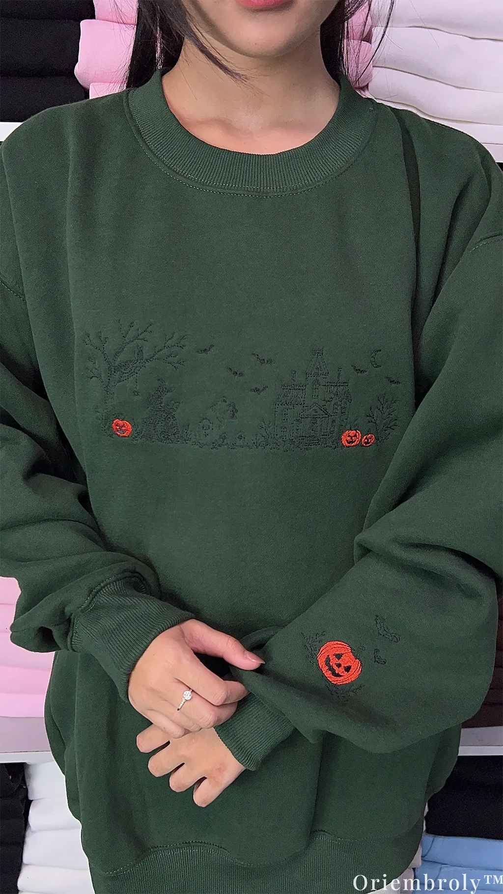 Vintage Halloween embroidered crewneck featuring spooky village scene - dark green